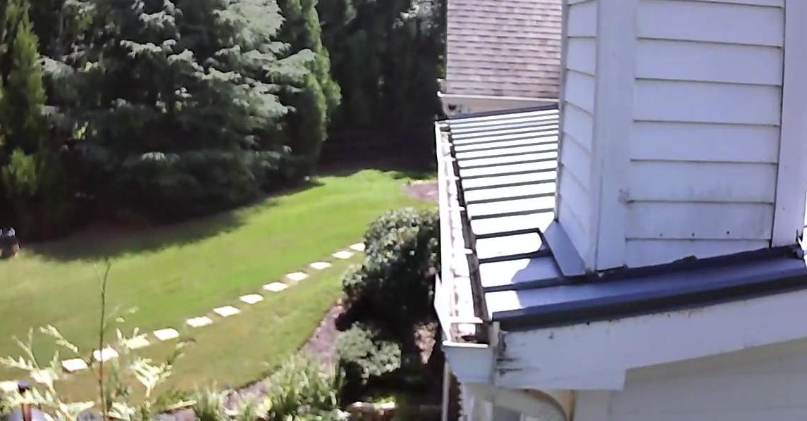 The same gutter clear after professional cleaning at an Alpharetta, Georgia home